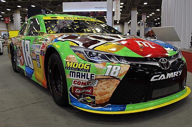 Who’s a Kyle Busch fan?!🙋🏻‍♀️ Come check out his car at the #DFWAutoShow! #dallas #nascar #kylebusch #autoshow #toyota #camry #racecar