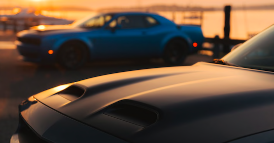 The only way to chase sunsets is in the Challenger. #dfwautoshow #dallas #cars #dodge #challenger https://t.co/RAGKJG7b6A